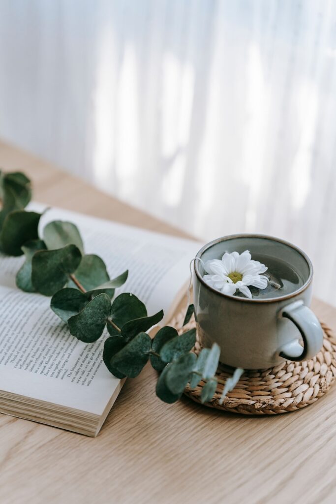 mug with flower and book